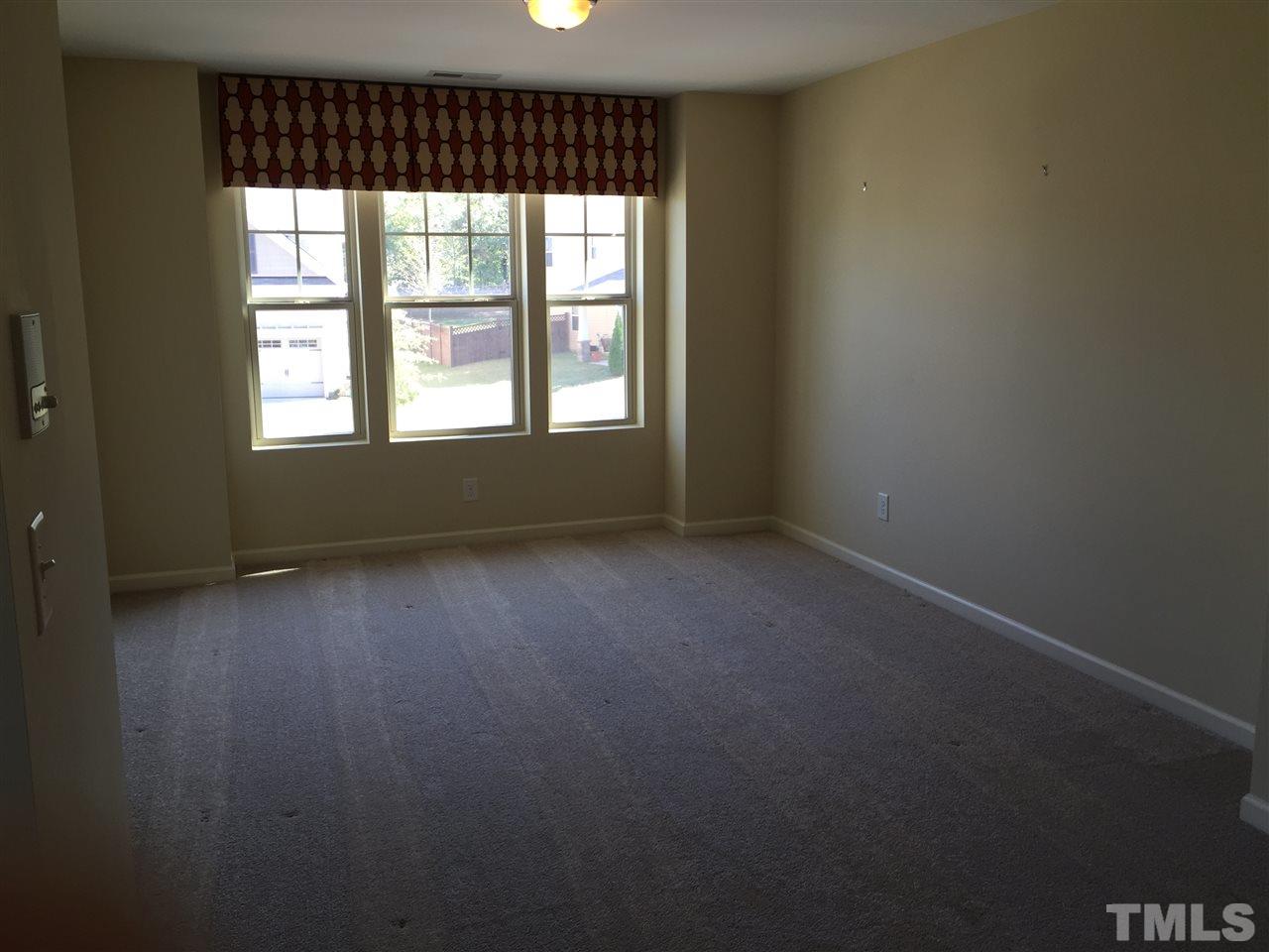 1314 Ranchester Road Knightdale, NC 27545 - Photo 12 of 25 an empty room with a window