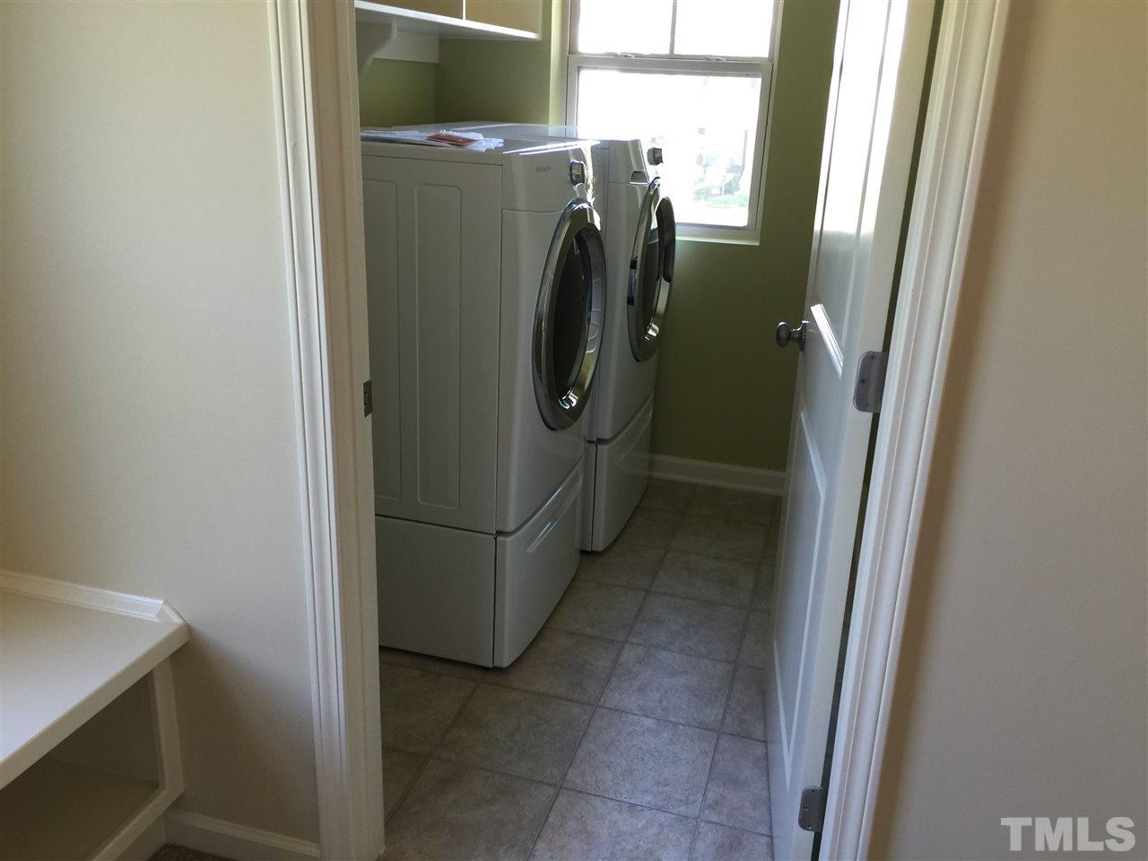 1314 Ranchester Road Knightdale, NC 27545 - Photo 13 of 25 a utility room with washer and dryer