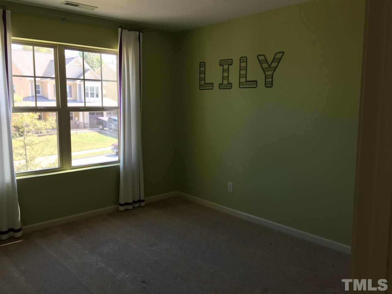 1314 Ranchester Road Knightdale, NC 27545 - Photo 21 of 25 a room with a window