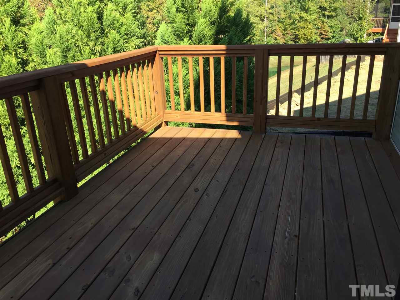 1314 Ranchester Road Knightdale, NC 27545 - Photo 6 of 25 a balcony with wooden floor