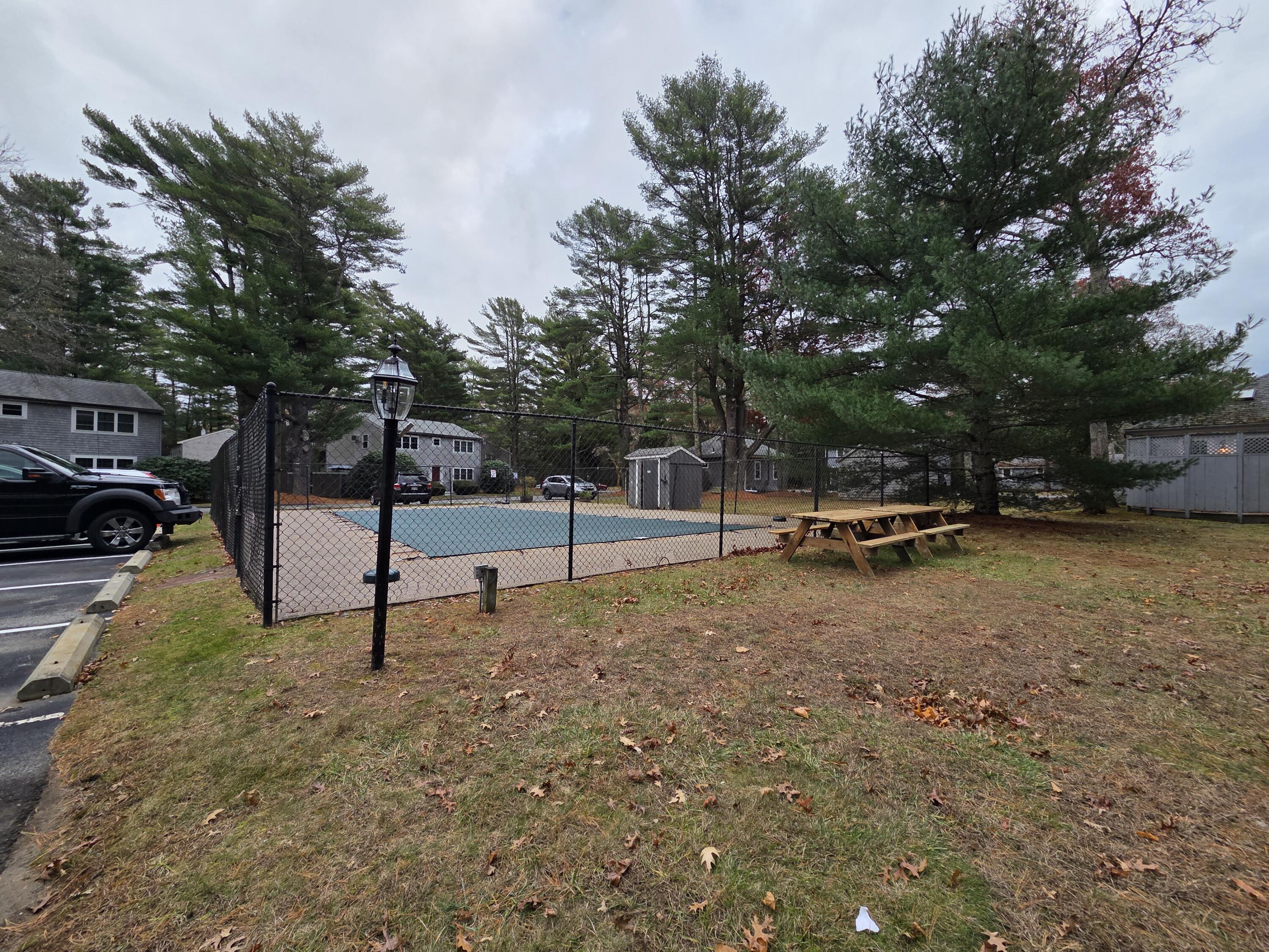 3040 Falmouth Road, Unit F3 Osterville, MA 02655 - Photo 12 of 14 a view of a park with swings