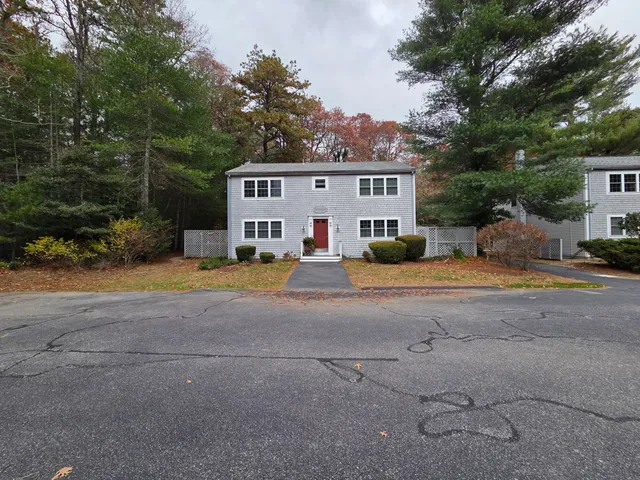 a view of a house with a street