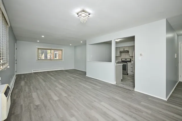 a kitchen with a sink cabinets and appliances