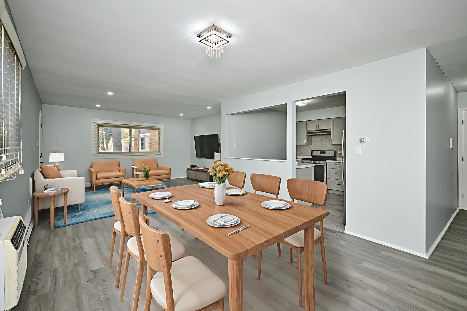 1320 Lore Lane, Unit 101A Lombard, IL 60148 - Photo 16 of 65 a view of a dining room with furniture and wooden floor