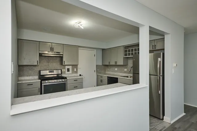 a bathroom with a shower and a toilet