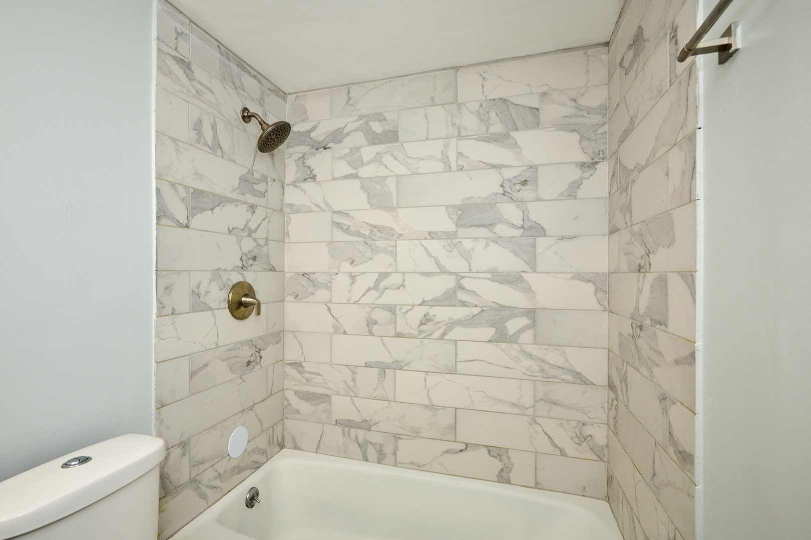 1320 Lore Lane, Unit 101A Lombard, IL 60148 - Photo 35 of 65 a bathroom with a shower and a toilet