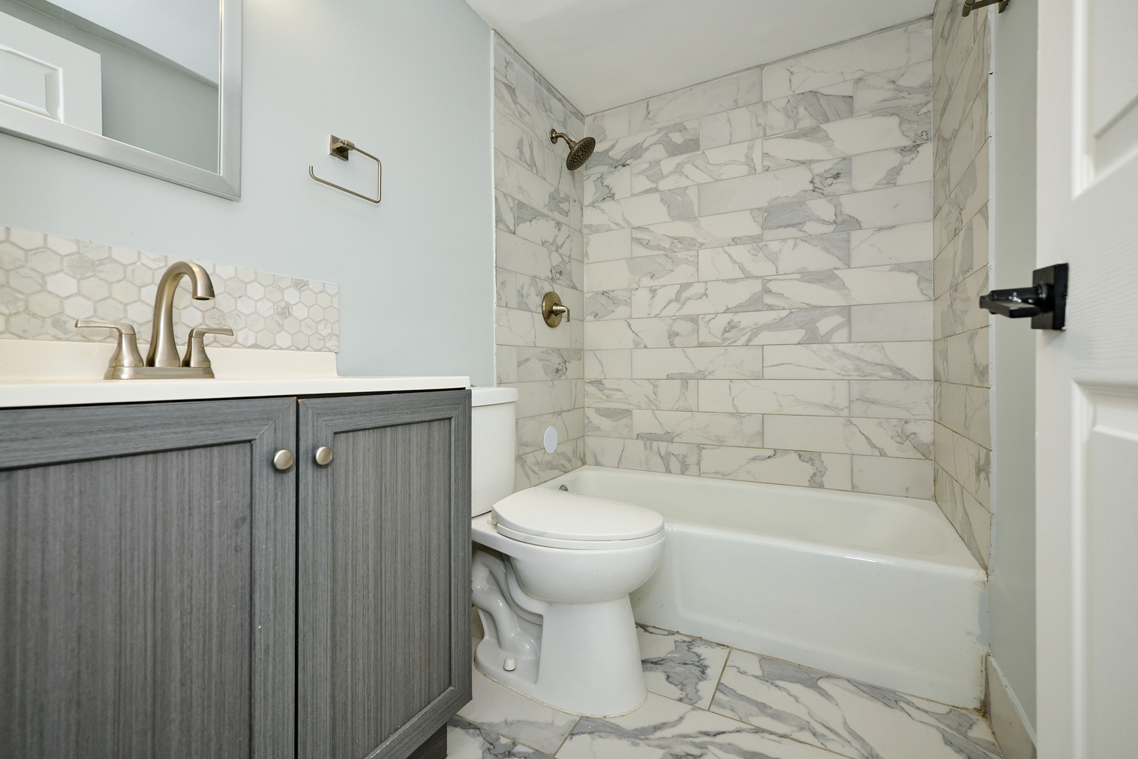 1320 Lore Lane, Unit 101A Lombard, IL 60148 - Photo 36 of 65 a bathroom with a sink toilet and shower