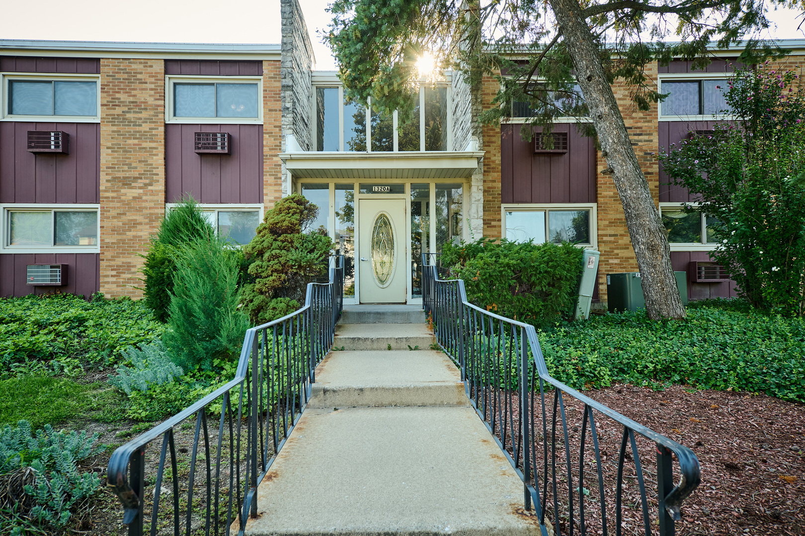 1320 Lore Lane, Unit 101A Lombard, IL 60148 - Photo 57 of 65 a view of a house with brick walls