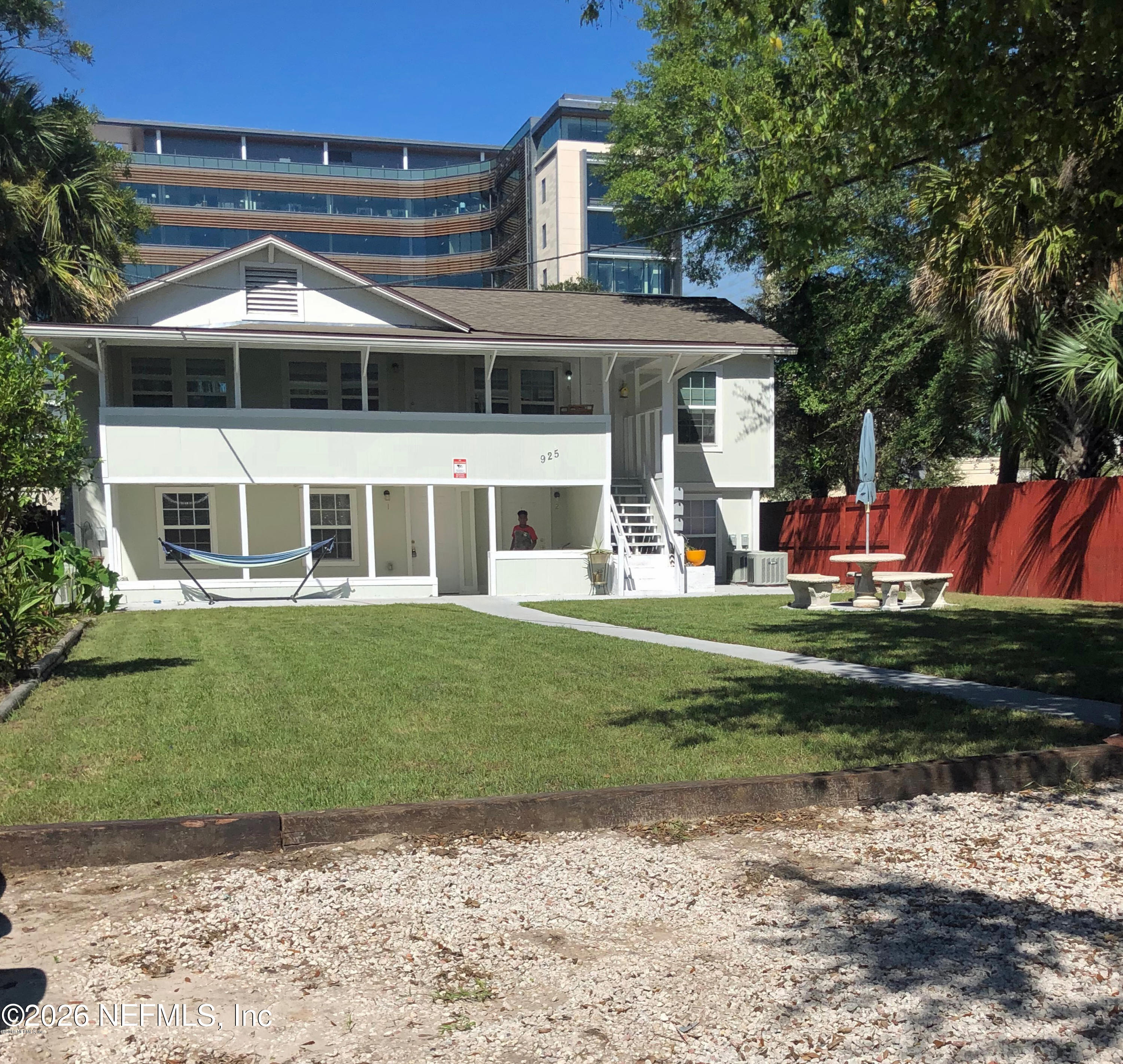925 Phillips Street, Unit 3 Jacksonville, FL 32207 - Photo 1 of 10 a front view of a house with a garden