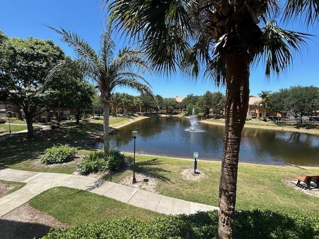 8849 Villa View Circle, Unit 203 Orlando, FL 32821 - Photo 13 of 20 a view of a lake with outdoor space