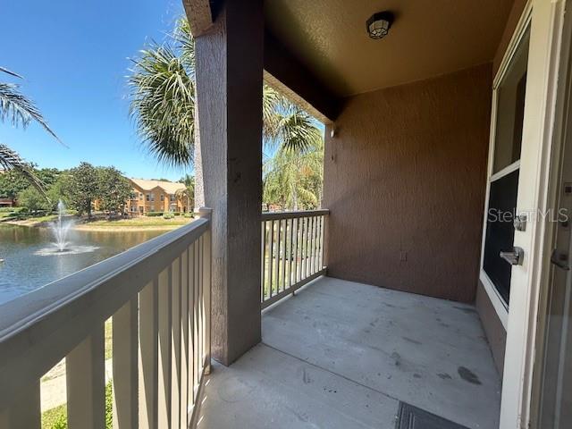 8849 Villa View Circle, Unit 203 Orlando, FL 32821 - Photo 14 of 20 a view of a porch