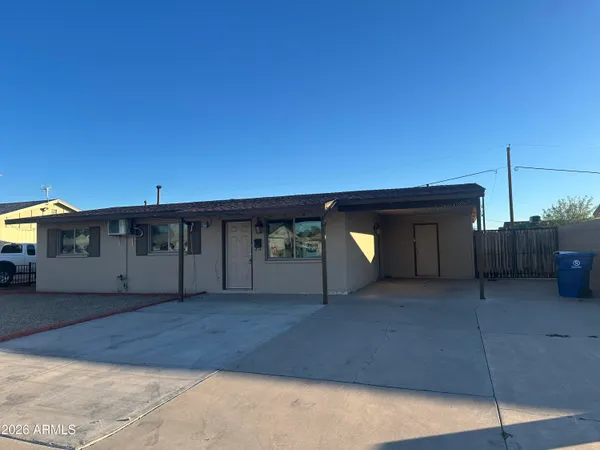 a view of a house with a roof deck