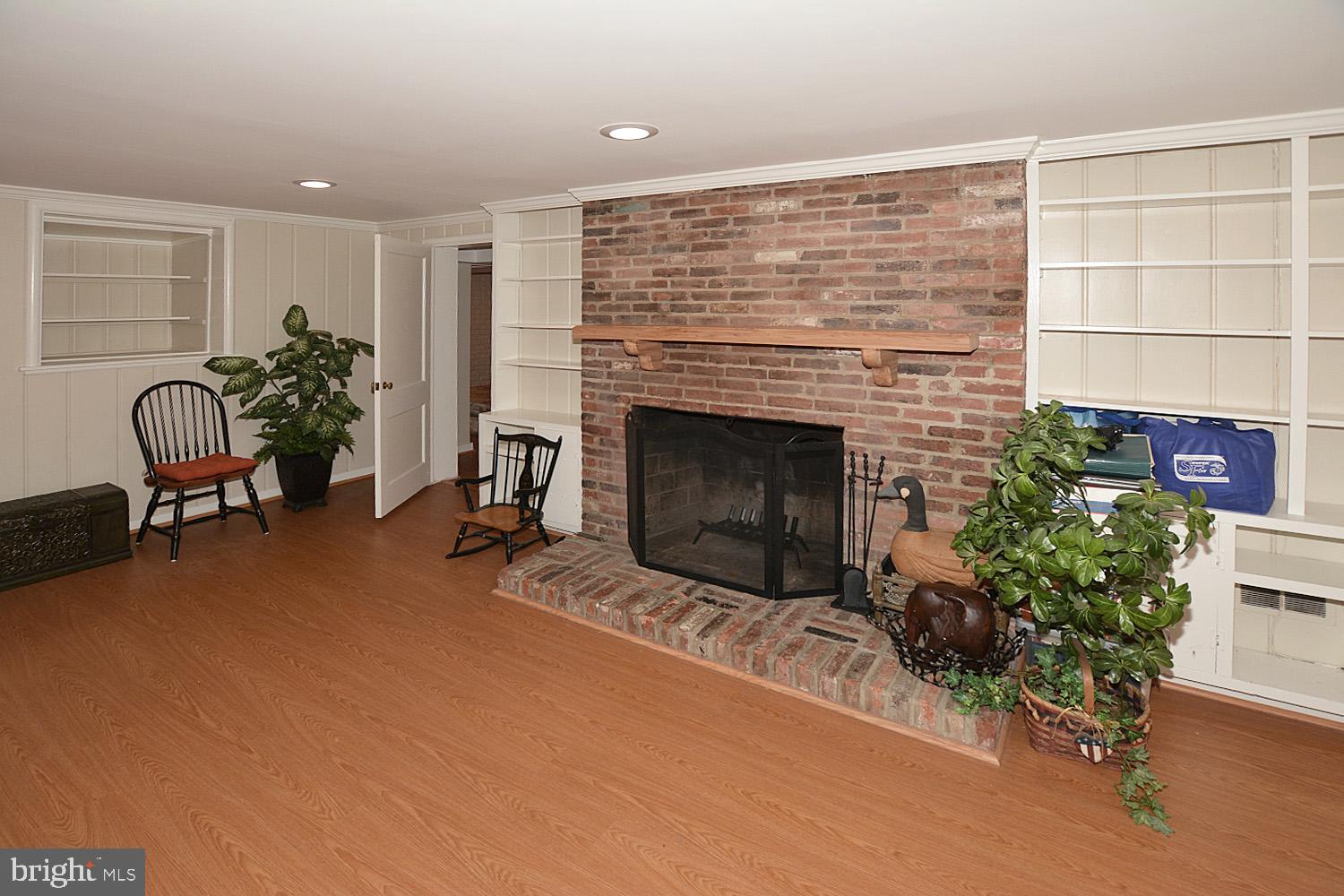 1515 23rd Road South Arlington, VA 22202 - Photo 29 of 34 RECREATION ROOM WITH WOOD FIREPLACE