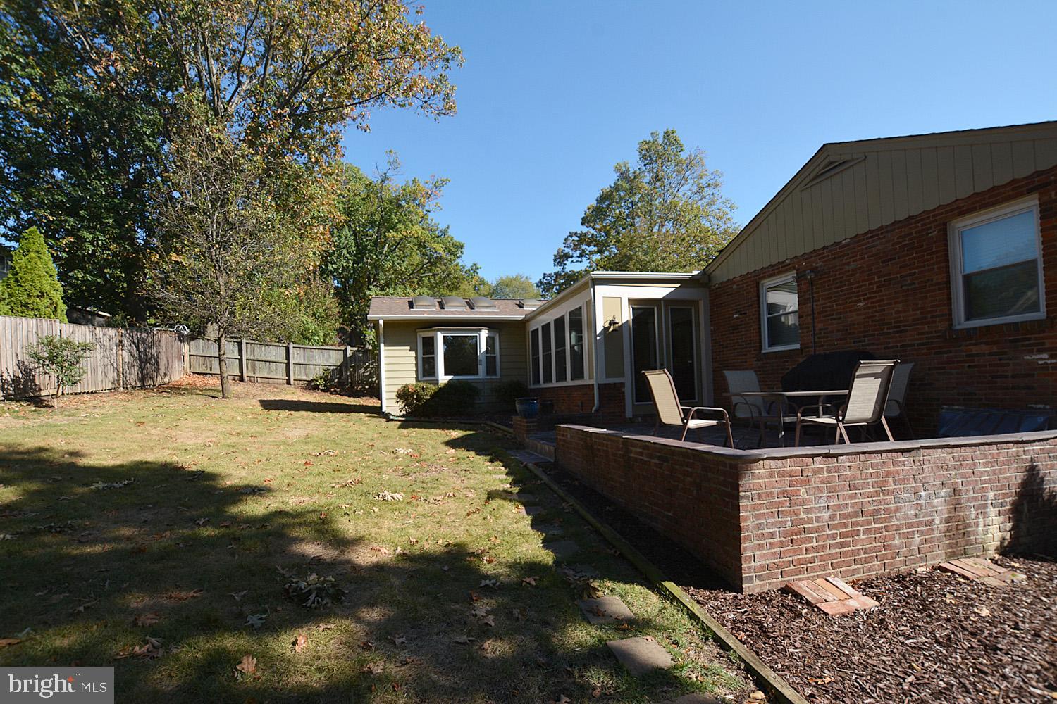1515 23rd Road South Arlington, VA 22202 - Photo 5 of 34 BACKYARD VIEW OF PATIO AND SUNROOM
