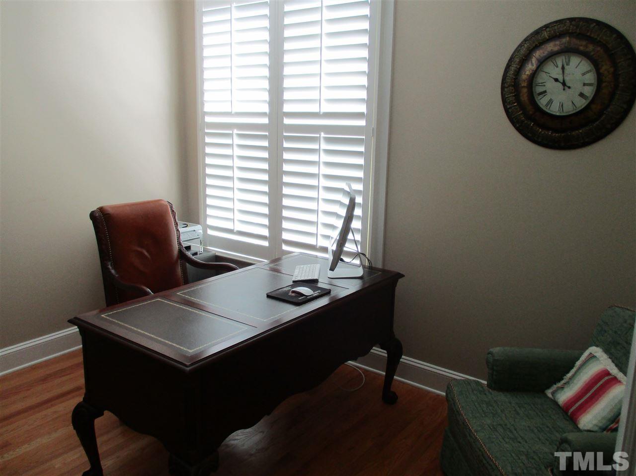 2513 Wertherson Lane Raleigh, NC 27613 - Photo 11 of 25 a view of a workspace with a window