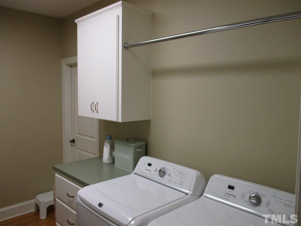 2513 Wertherson Lane Raleigh, NC 27613 - Photo 16 of 25 a utility room with dryer and washer