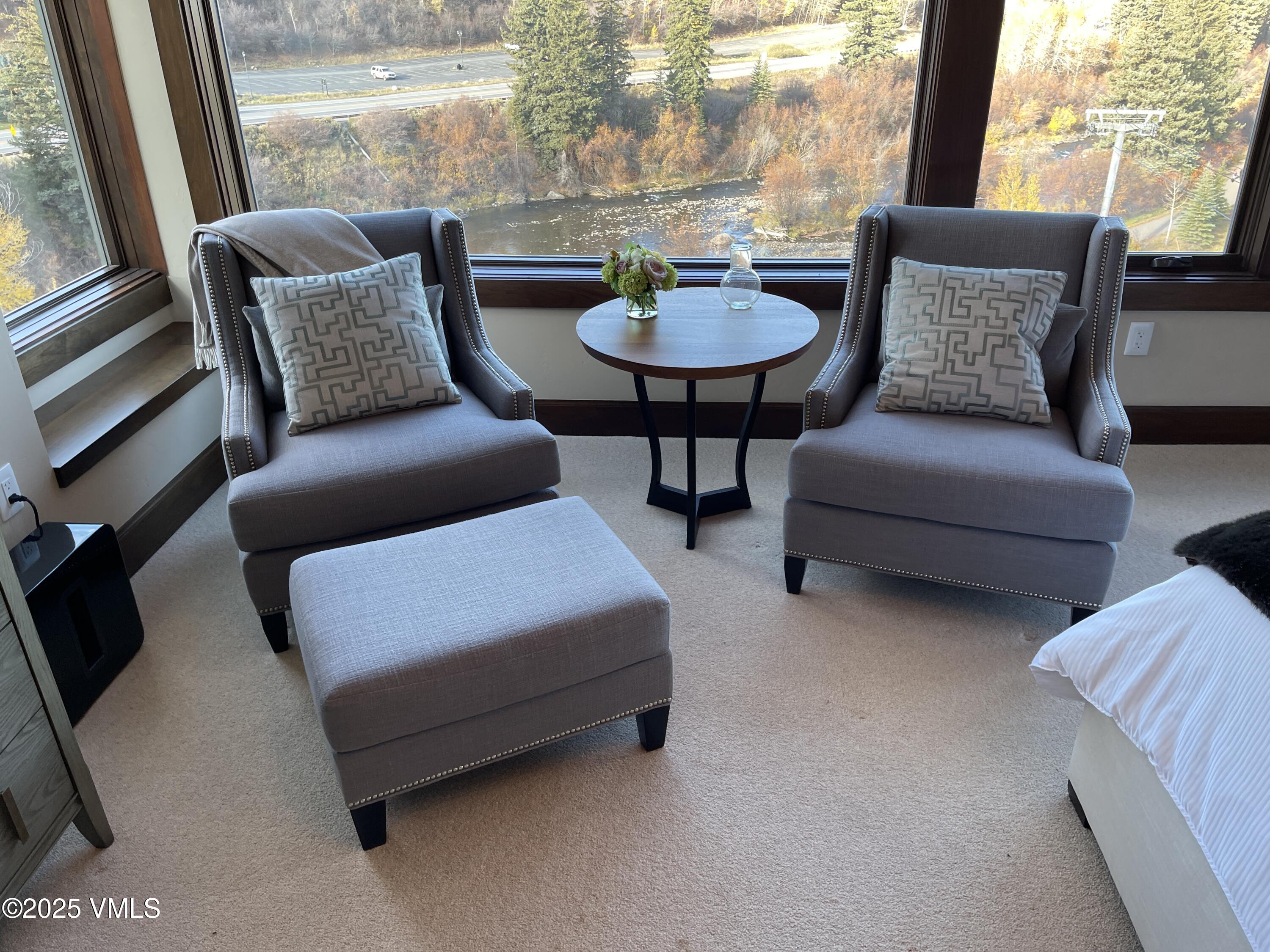 126 Riverfront Lane, Unit 510 Avon, CO 81620 - Photo 18 of 54 a outdoor living room with furniture and a table