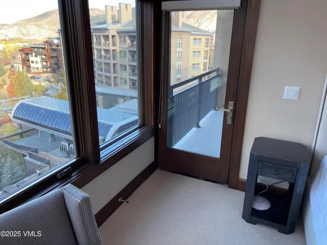 a view of a lake with a building in the background