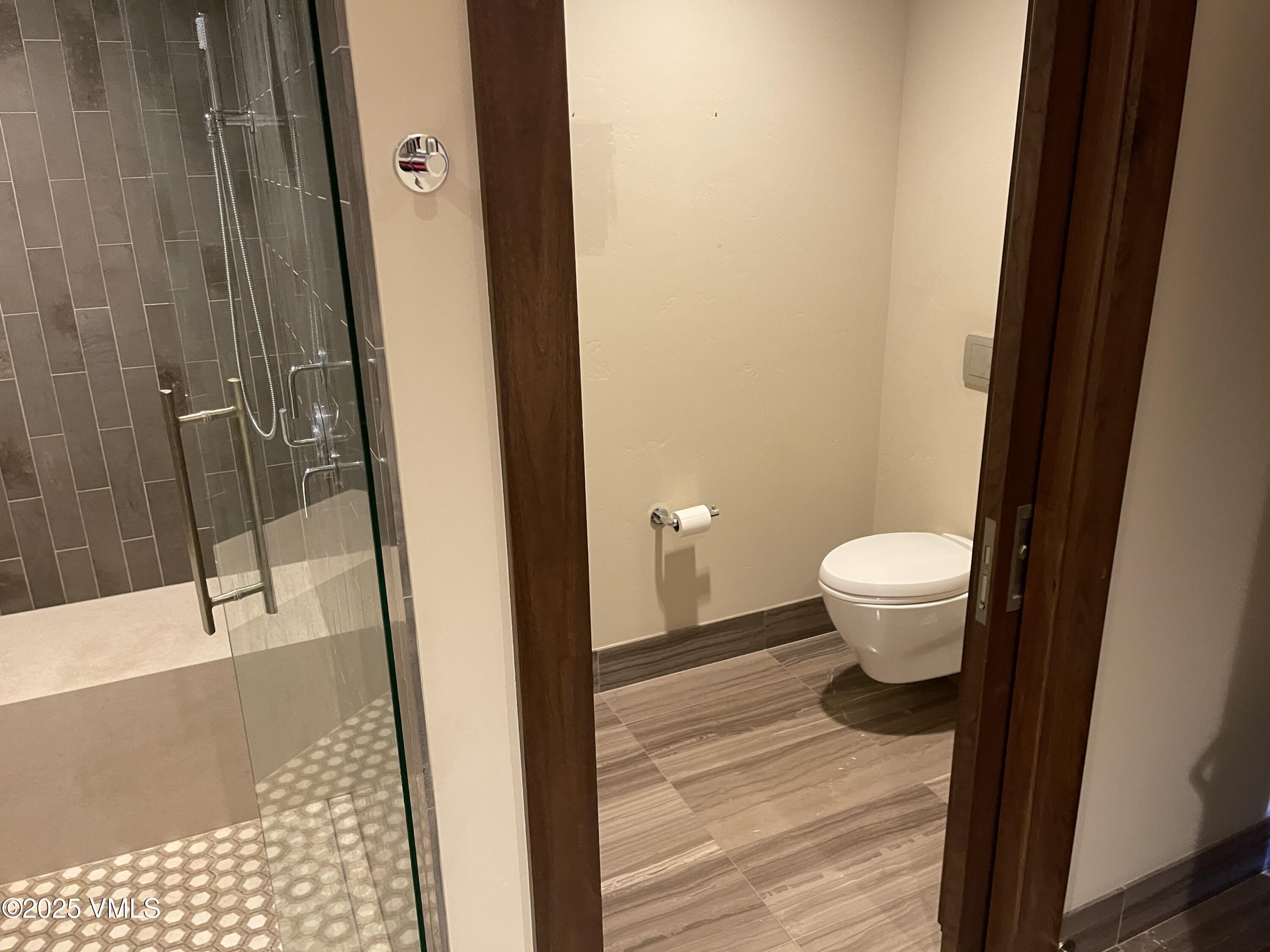 126 Riverfront Lane, Unit 510 Avon, CO 81620 - Photo 29 of 54 a bathroom with a sink and a toilet