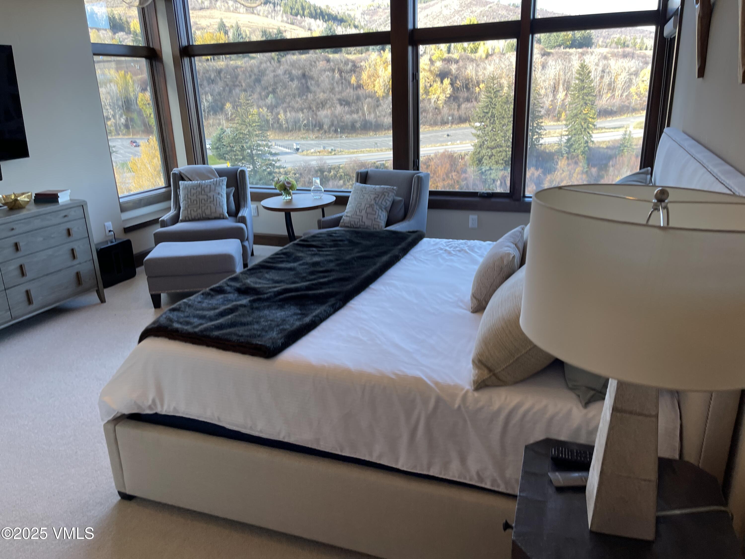 126 Riverfront Lane, Unit 510 Avon, CO 81620 - Photo 44 of 54 a living room with furniture and a window