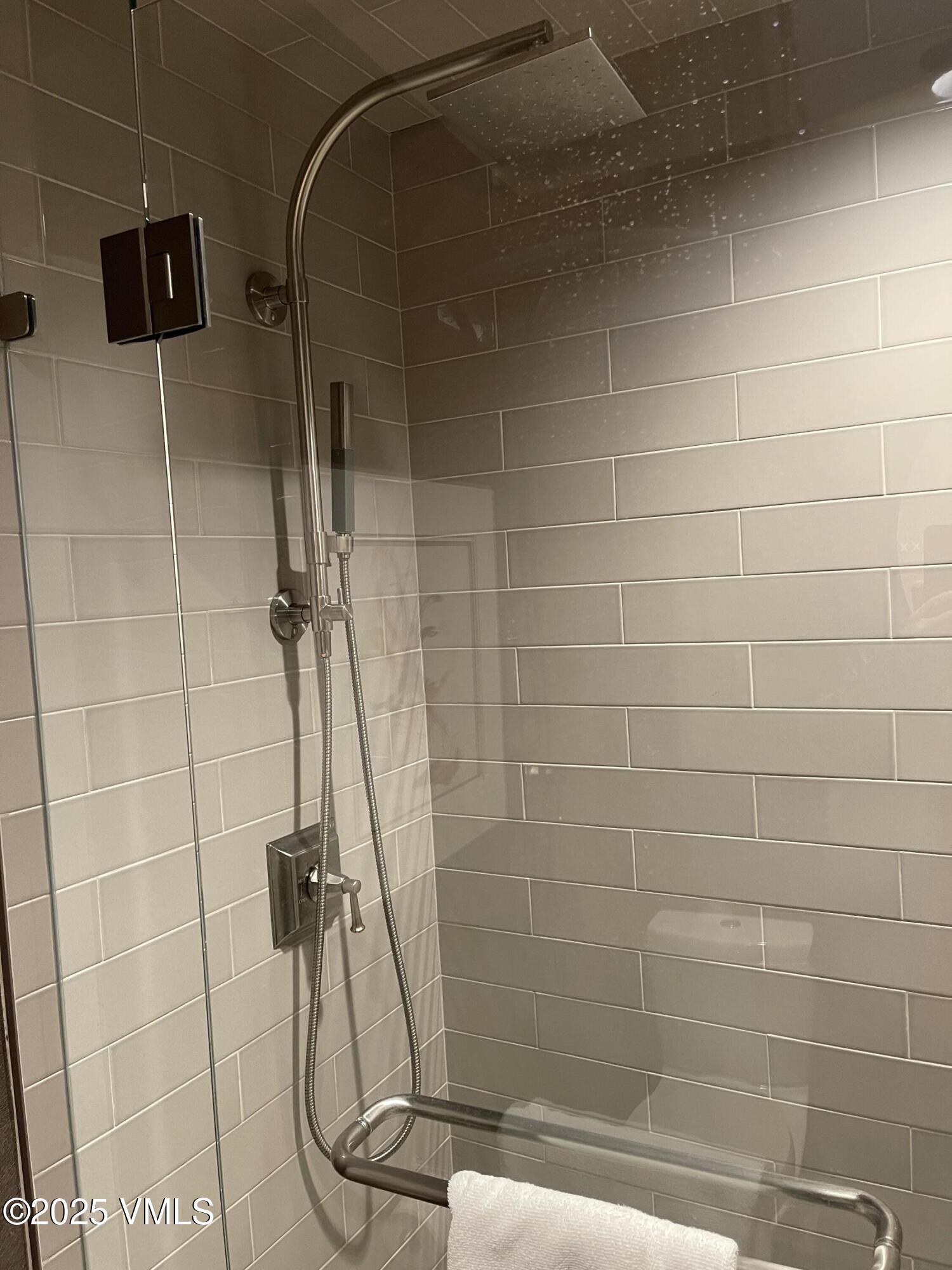 126 Riverfront Lane, Unit 510 Avon, CO 81620 - Photo 49 of 54 a bathroom with a shower