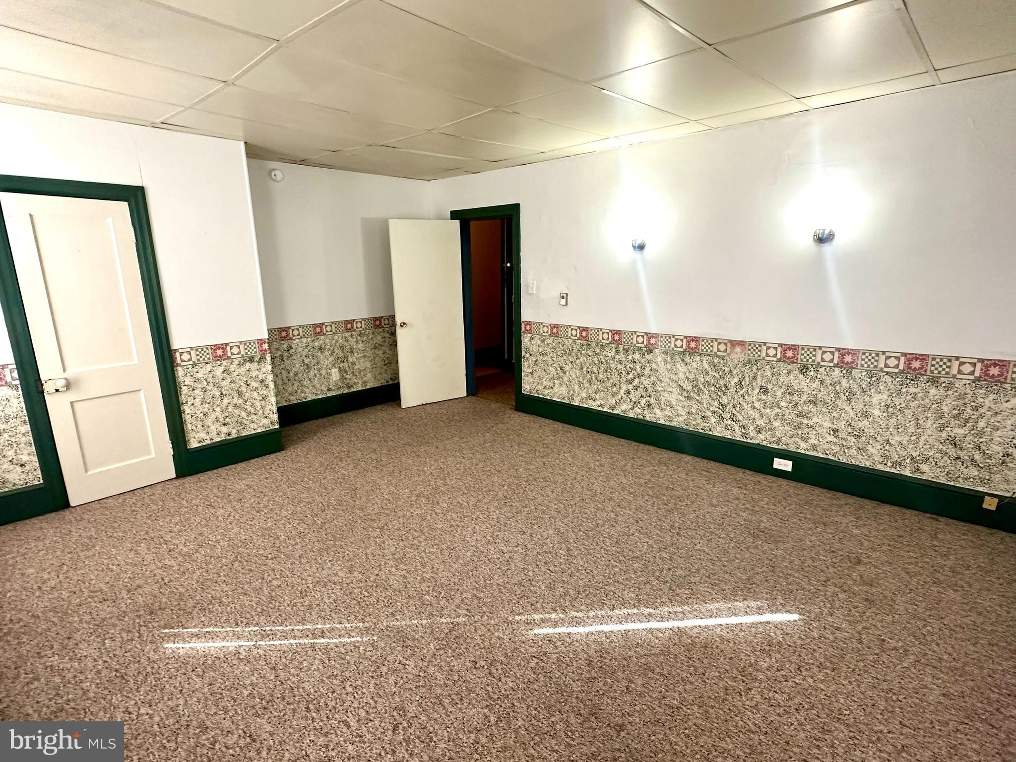 4576 Lemar Road, Unit 3 Mercersburg, PA 17236 - Photo 9 of 15 a view of an empty room with windows