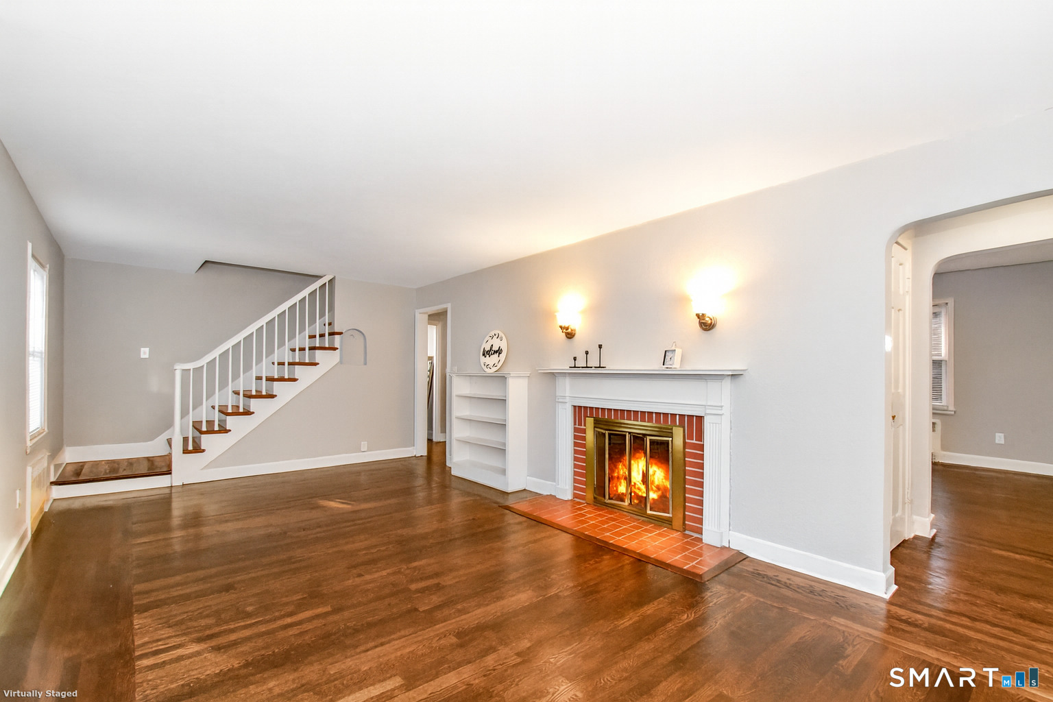 63 Park Road Hamden, CT 06517 - Photo 13 of 39 a view of an empty room with wooden floor and a window