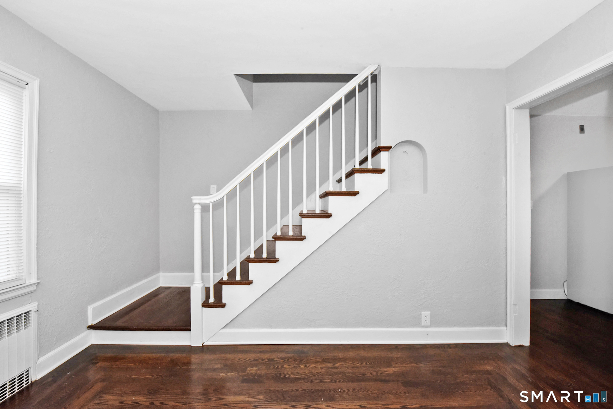 63 Park Road Hamden, CT 06517 - Photo 19 of 39 a view of entryway and hall with wooden floor