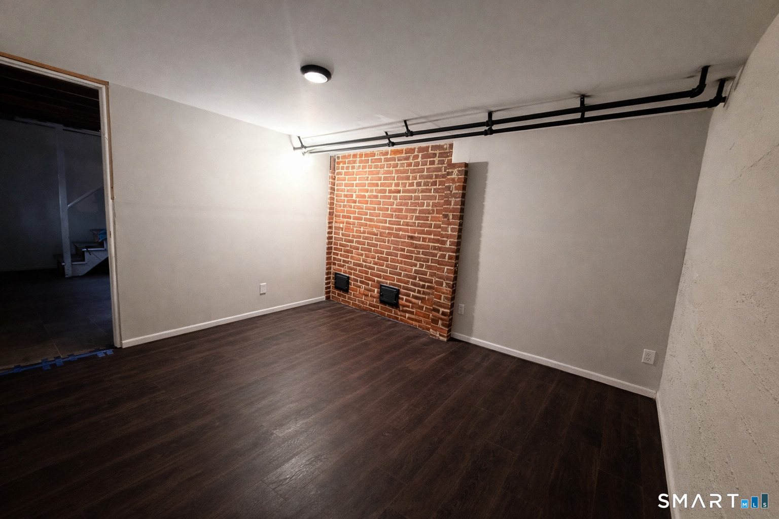 63 Park Road Hamden, CT 06517 - Photo 29 of 39 a view of a room with wooden floor and small window