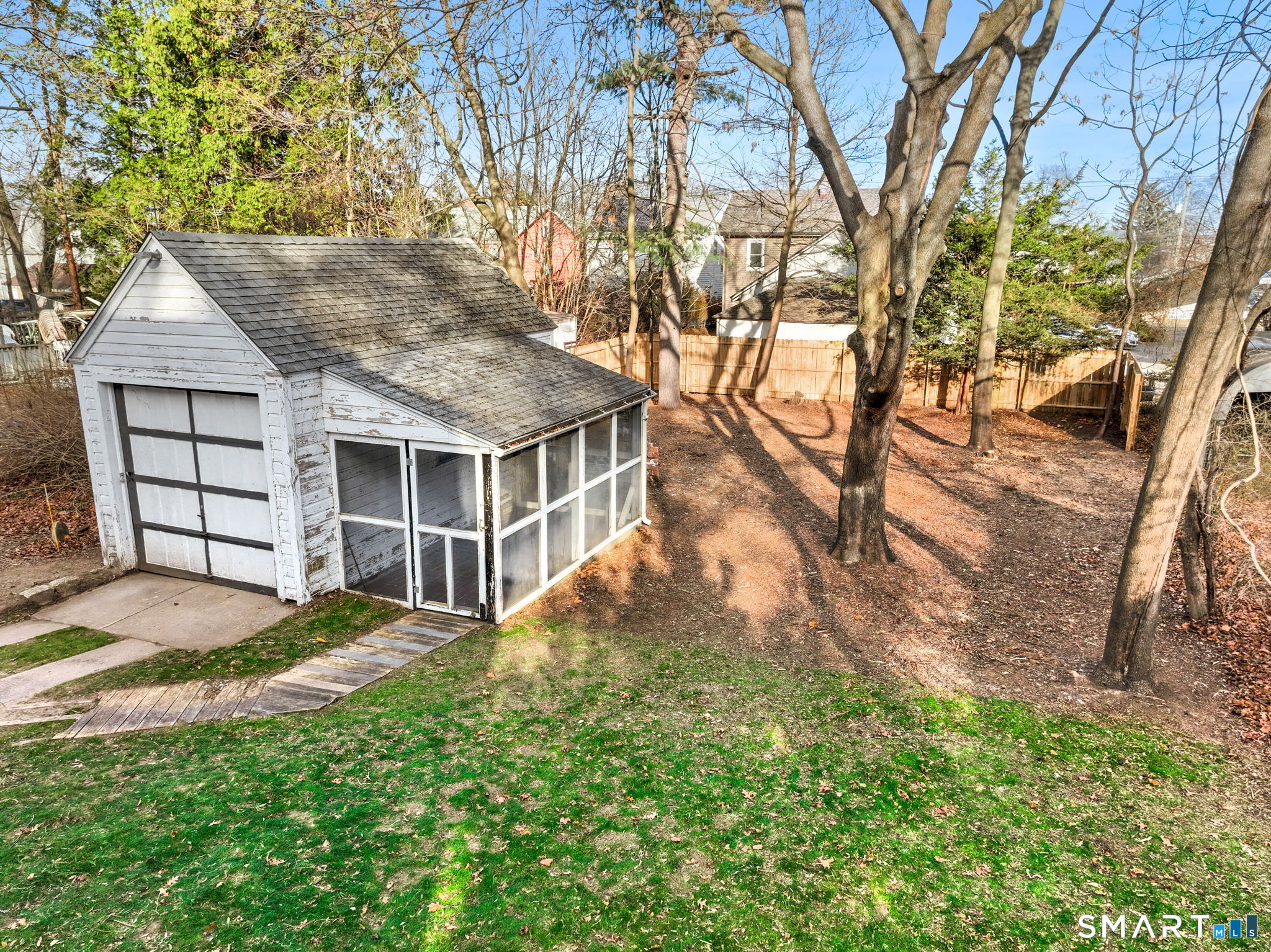 63 Park Road Hamden, CT 06517 - Photo 5 of 39 a view of house with backyard and trees