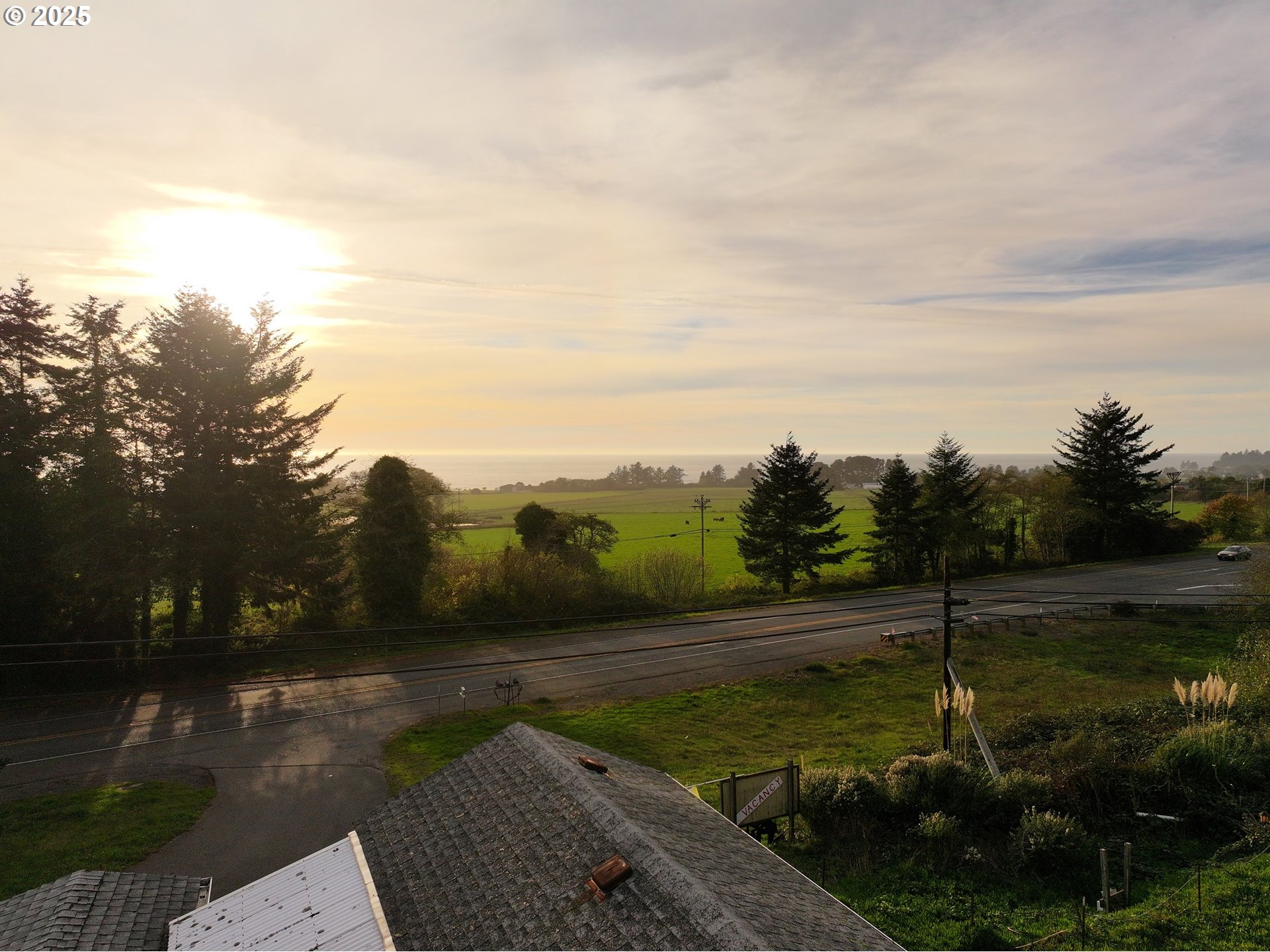 15061 Highway 101, Unit 4 Brookings, OR 97415 - Photo 2 of 19 a view of a street with a yard