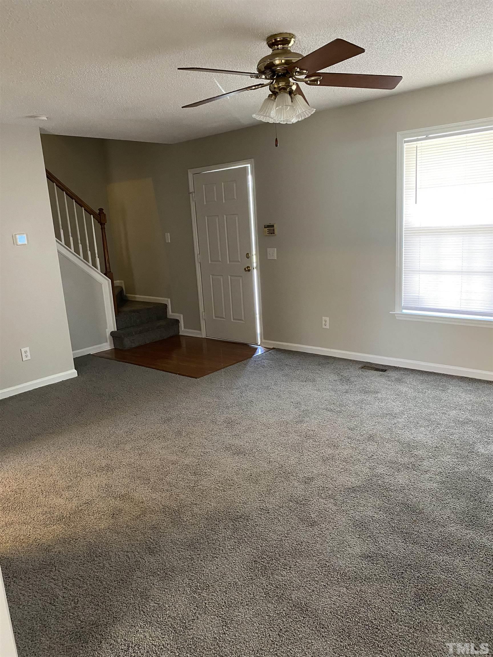 4433 Moss Spring Drive Raleigh, NC 27616 - Photo 12 of 25 a view of an empty room with a window