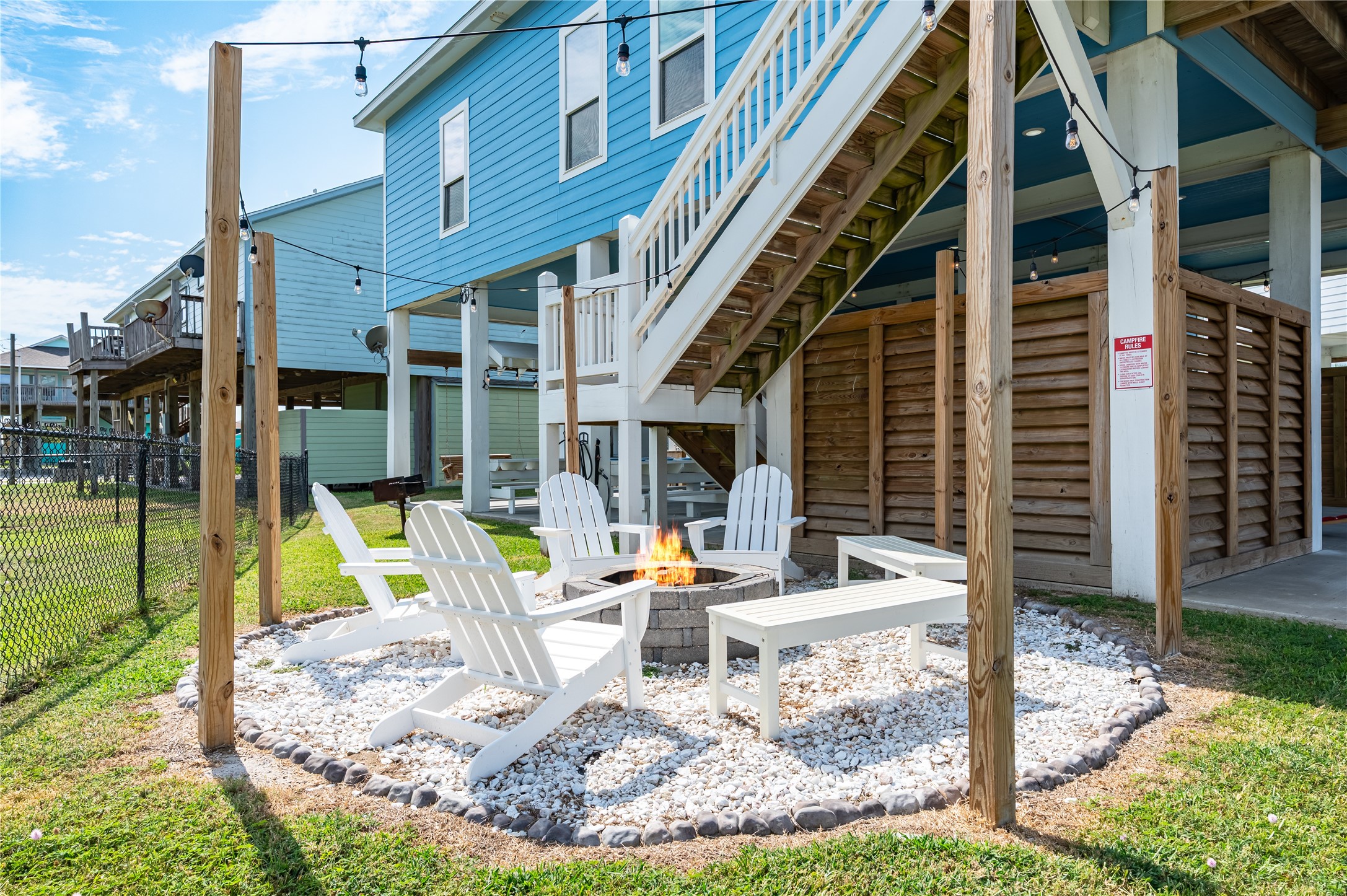 997 South Redfish Crystal Beach, TX 77650 - Photo 2 of 45 a view of house with outdoor seating