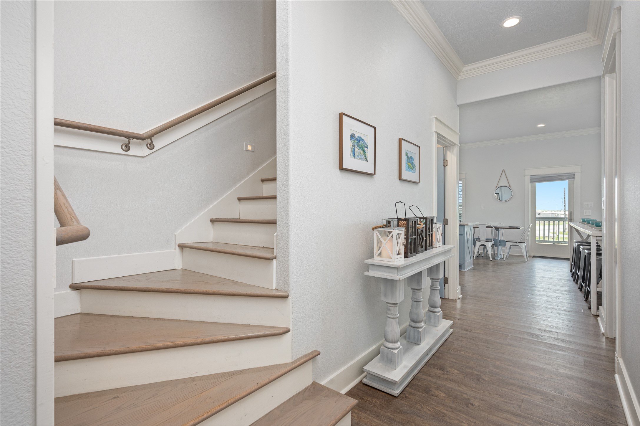 997 South Redfish Crystal Beach, TX 77650 - Photo 27 of 45 a view of entryway and hall with wooden floor