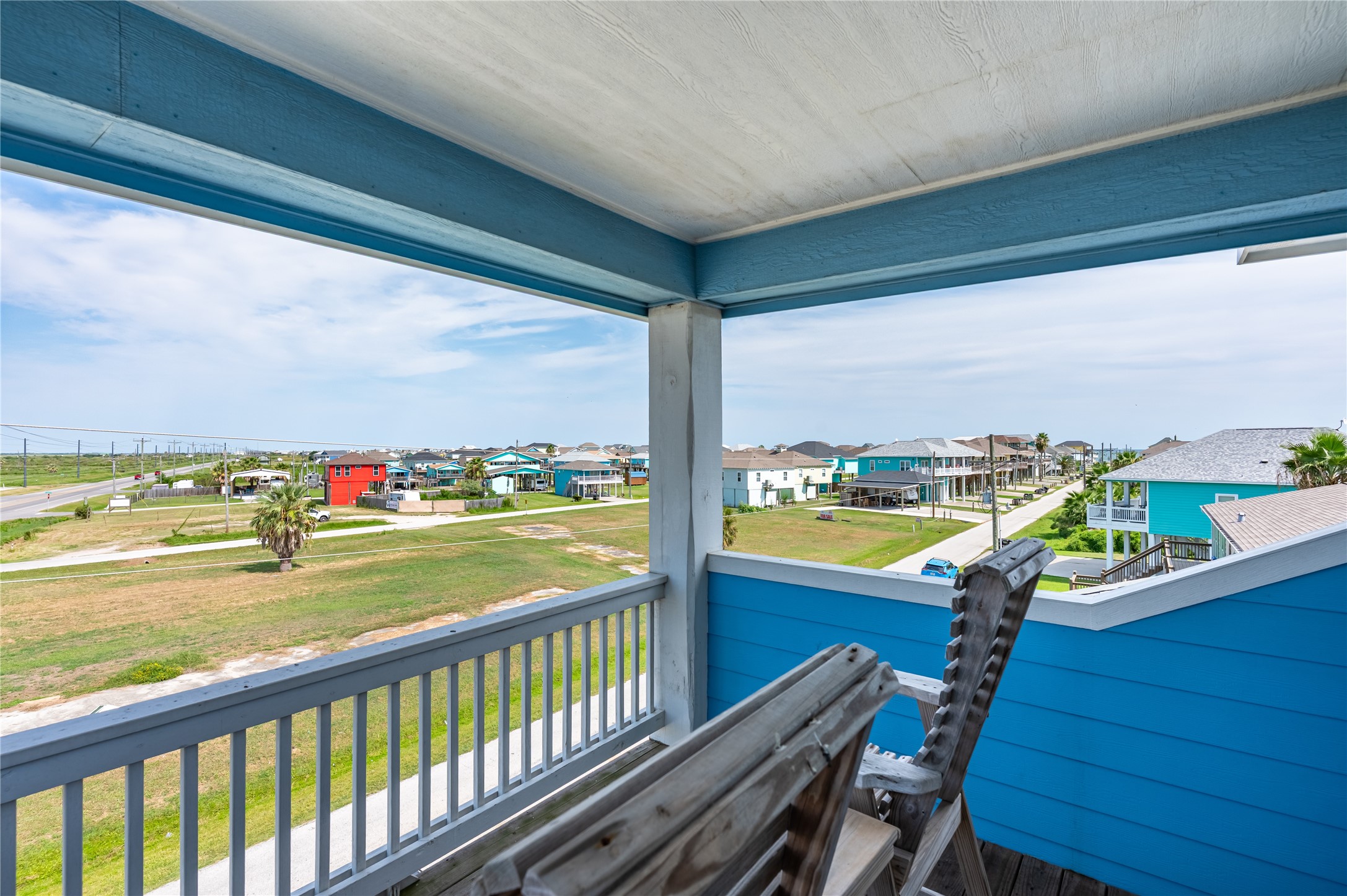 997 South Redfish Crystal Beach, TX 77650 - Photo 30 of 45 a view of a balcony with ocean view