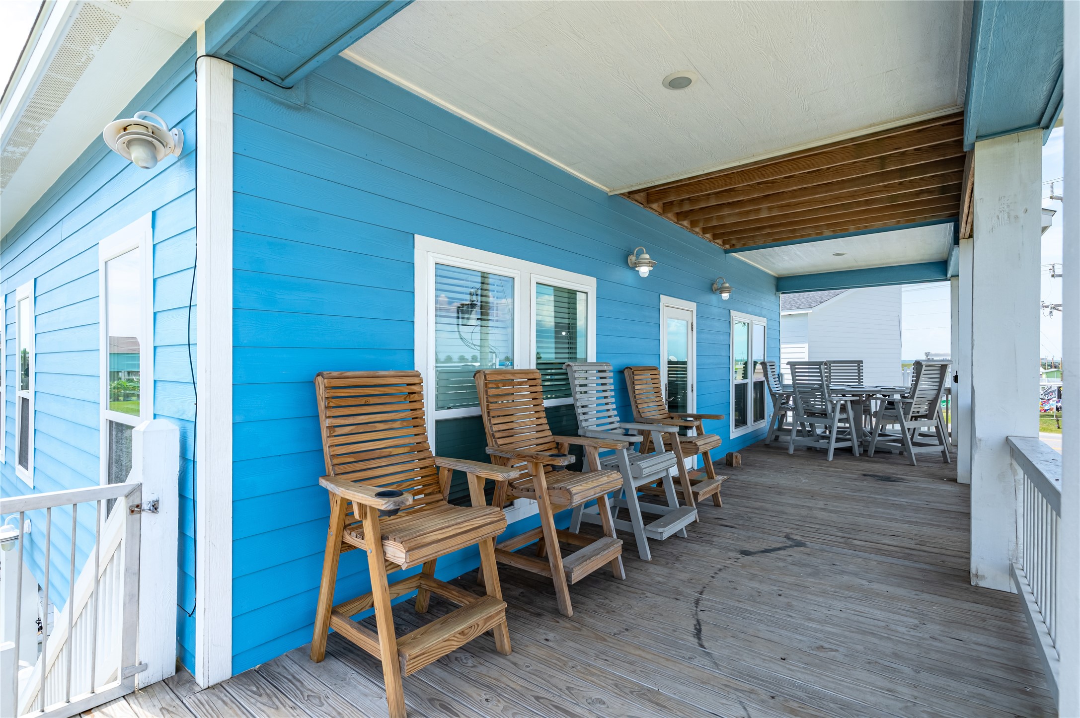 997 South Redfish Crystal Beach, TX 77650 - Photo 37 of 45 a view of a chairs and table in a patio