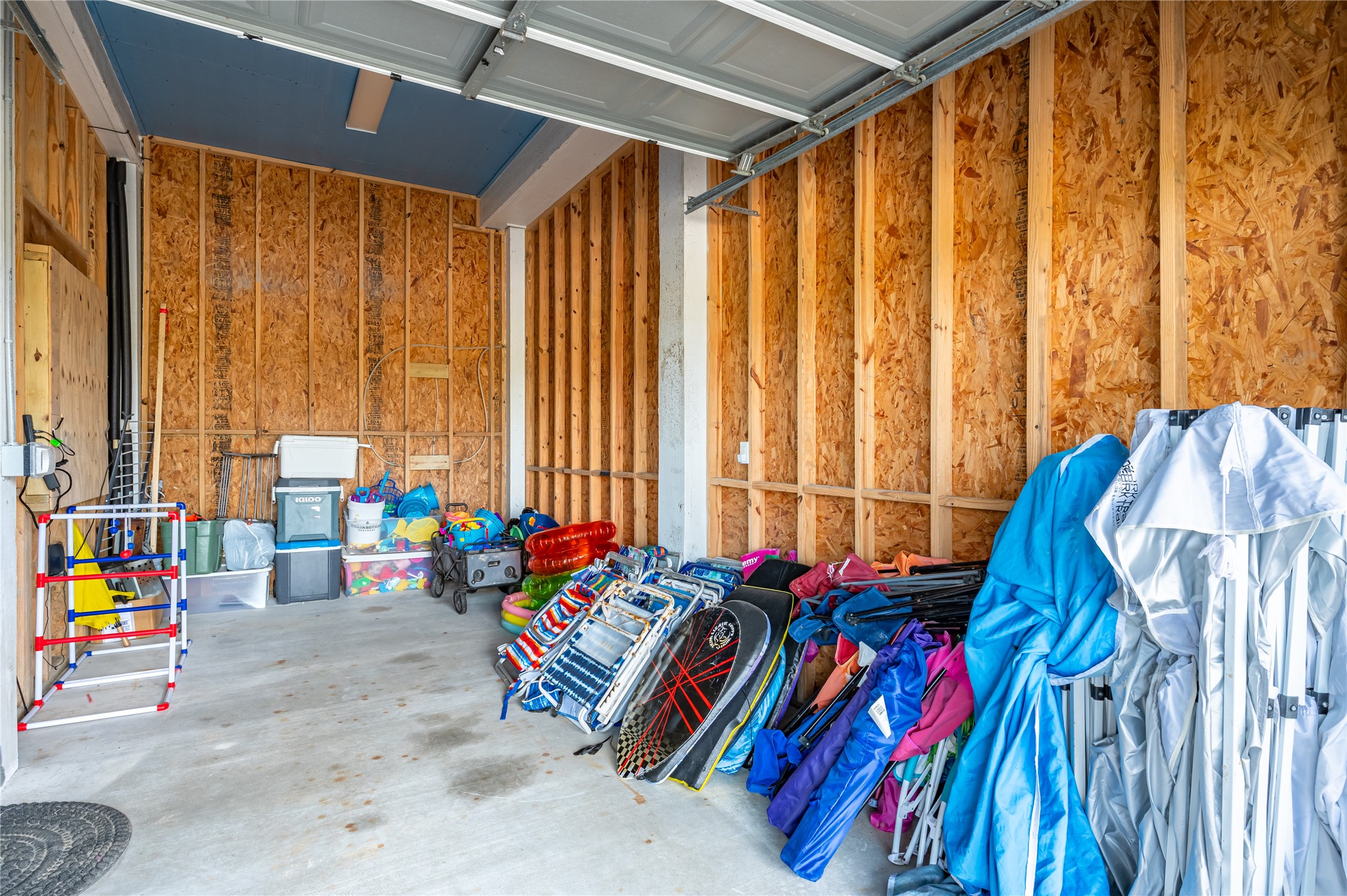 997 South Redfish Crystal Beach, TX 77650 - Photo 43 of 45 a view of walk in closet with clothes and shoes