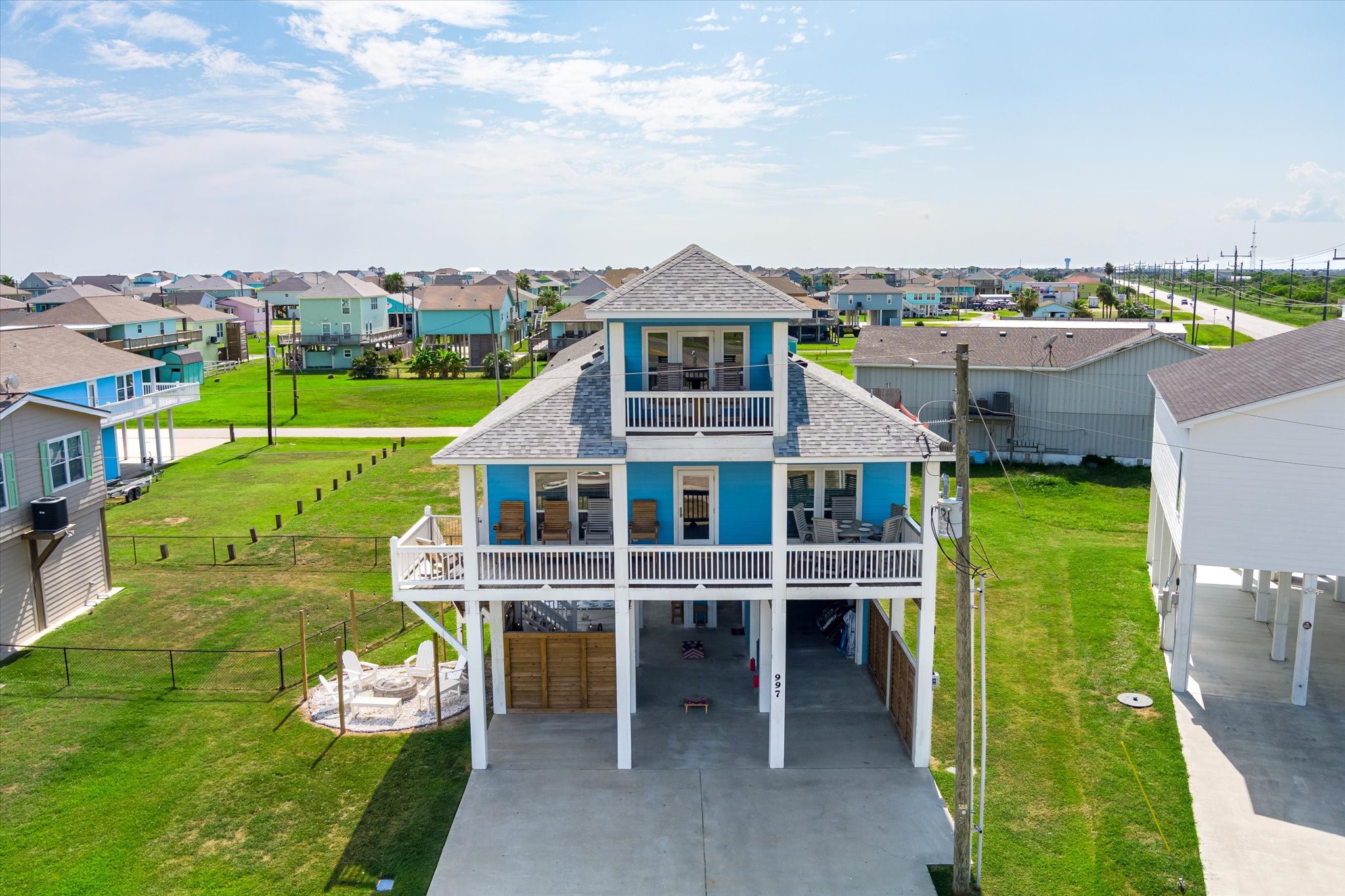 997 South Redfish Crystal Beach, TX 77650 - Photo 44 of 45 an aerial view of a house with a garden and stairs