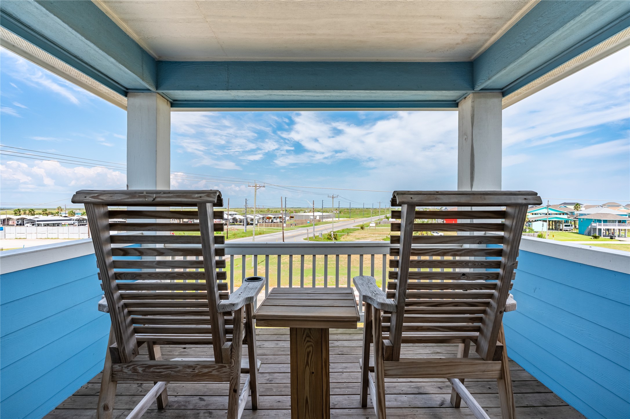 997 South Redfish Crystal Beach, TX 77650 - Photo 6 of 45 a view of a balcony with chairs