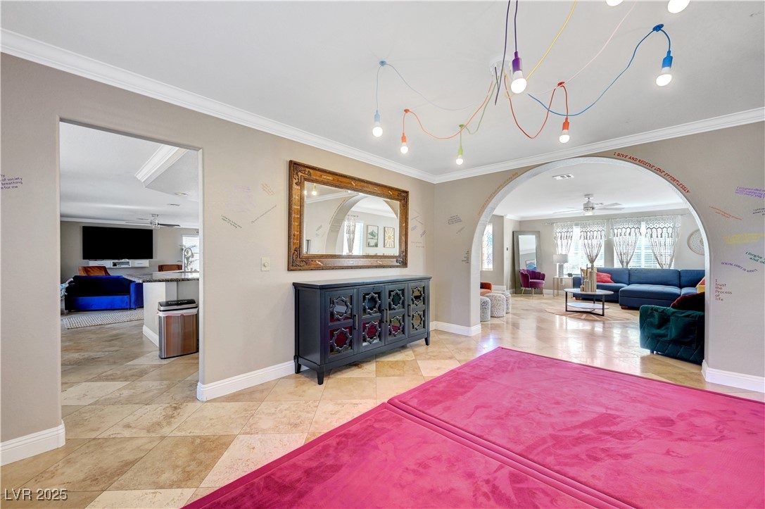 1486 Powder Horn Drive Henderson, NV 89014 - Photo 16 of 99 Bedroom featuring arched walkways and ornamental molding