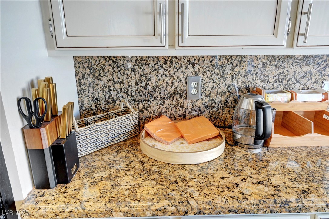 1486 Powder Horn Drive Henderson, NV 89014 - Photo 23 of 99 Kitchen view of light stone counters