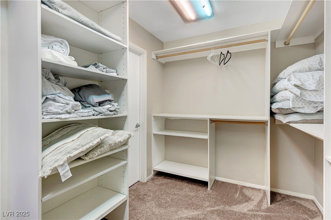 1486 Powder Horn Drive Henderson, NV 89014 - Photo 59 of 99 Walk in closet with light carpet