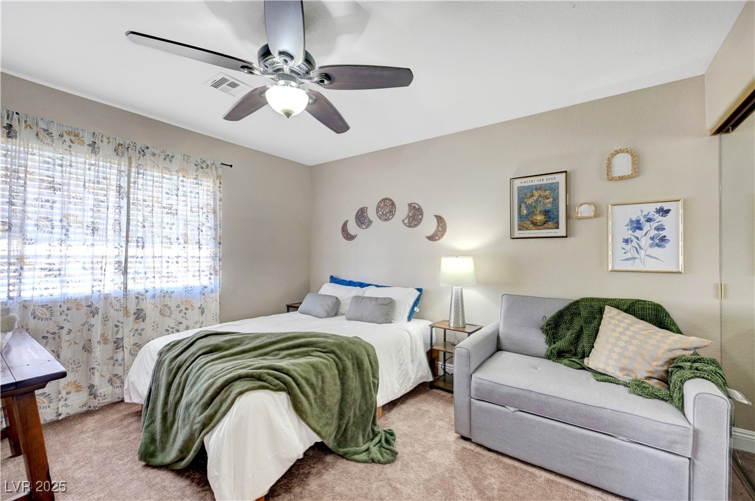 1486 Powder Horn Drive Henderson, NV 89014 - Photo 61 of 99 Bedroom featuring carpet floors and ceiling fan