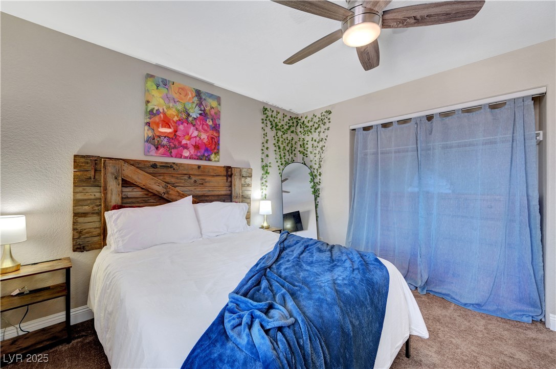 1486 Powder Horn Drive Henderson, NV 89014 - Photo 71 of 99 Bedroom with carpet floors and ceiling fan