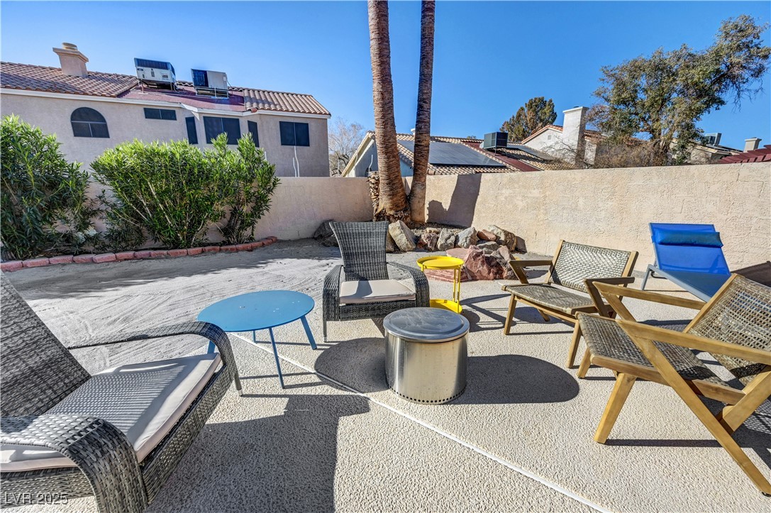 1486 Powder Horn Drive Henderson, NV 89014 - Photo 90 of 99 Fenced backyard with a patio area
