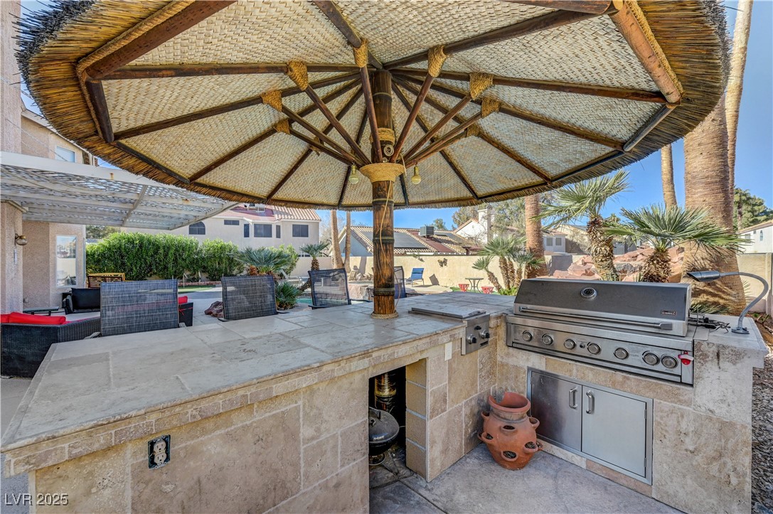 1486 Powder Horn Drive Henderson, NV 89014 - Photo 95 of 99 View of patio featuring an outdoor kitchen