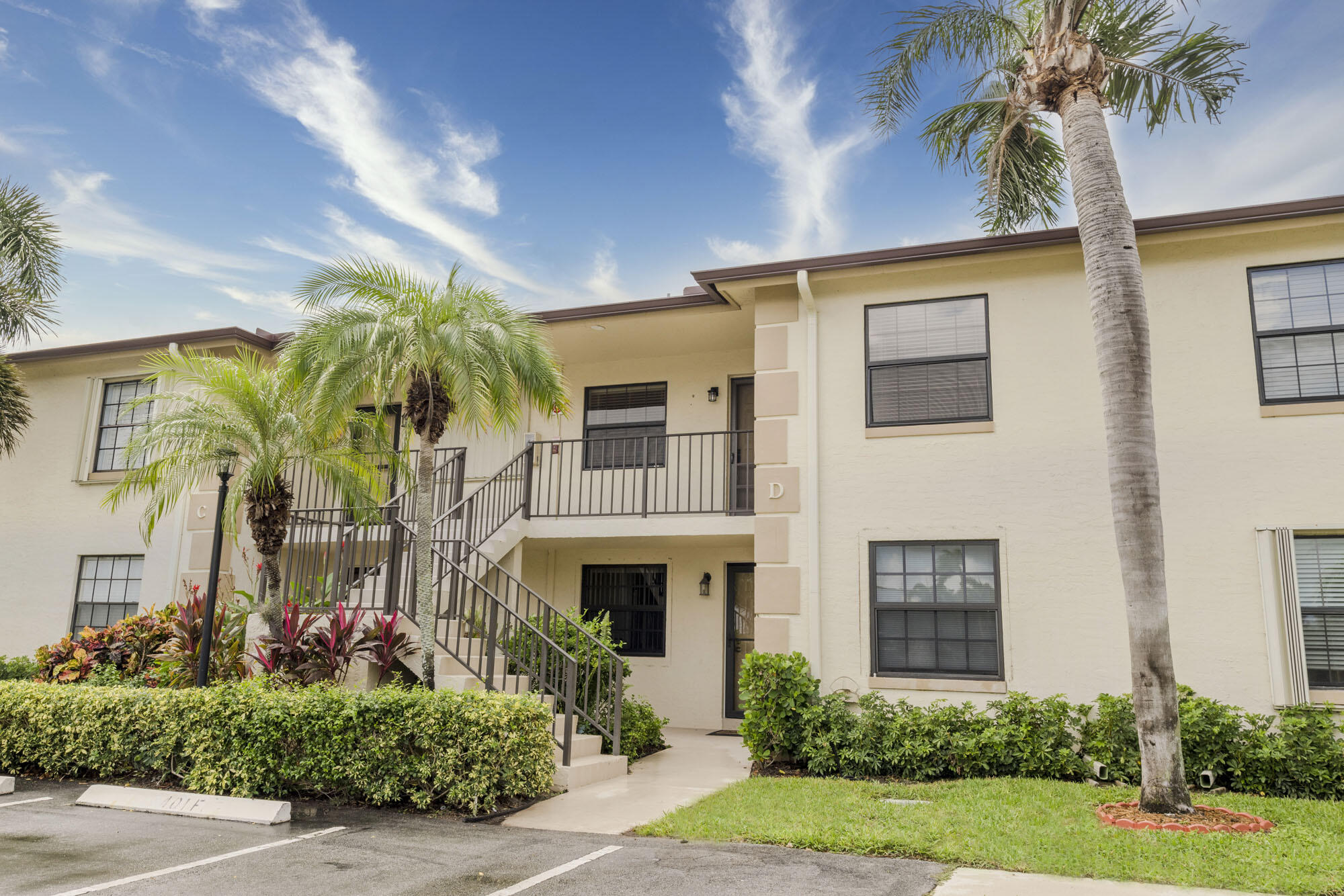 402 Pinecrest Circle, Unit D Jupiter, FL 33458 - Photo 1 of 24 Exterior Front