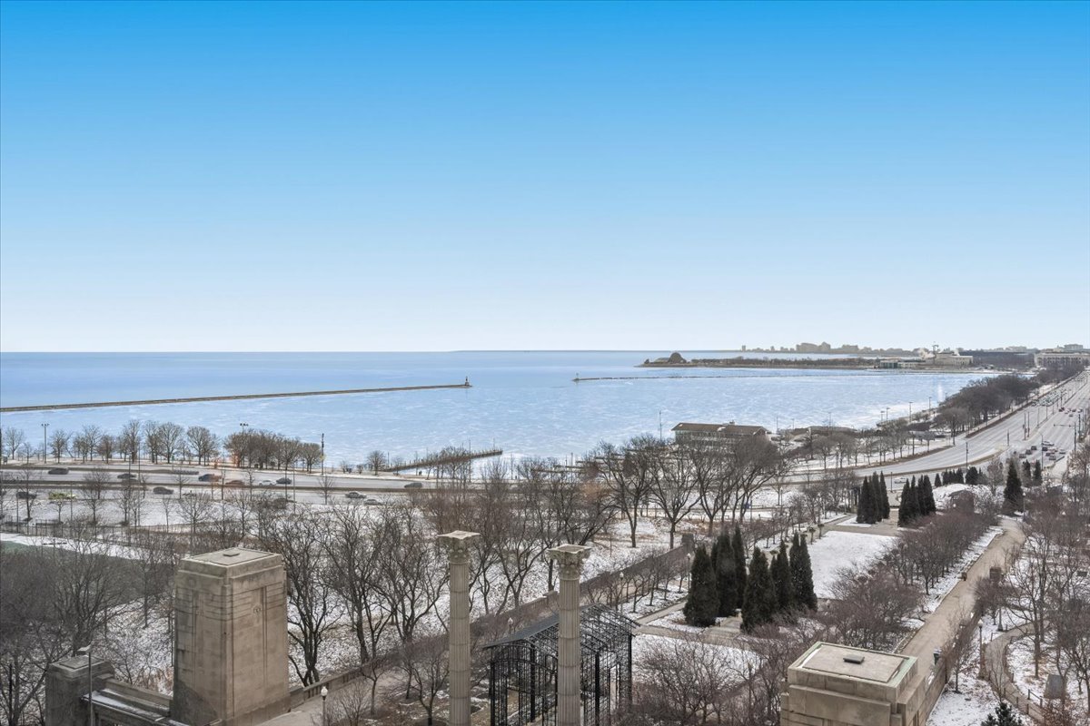 360 East Randolph Street, Unit 1002 Chicago, IL 60601 - Photo 11 of 27 a view of a lake with building in front of it