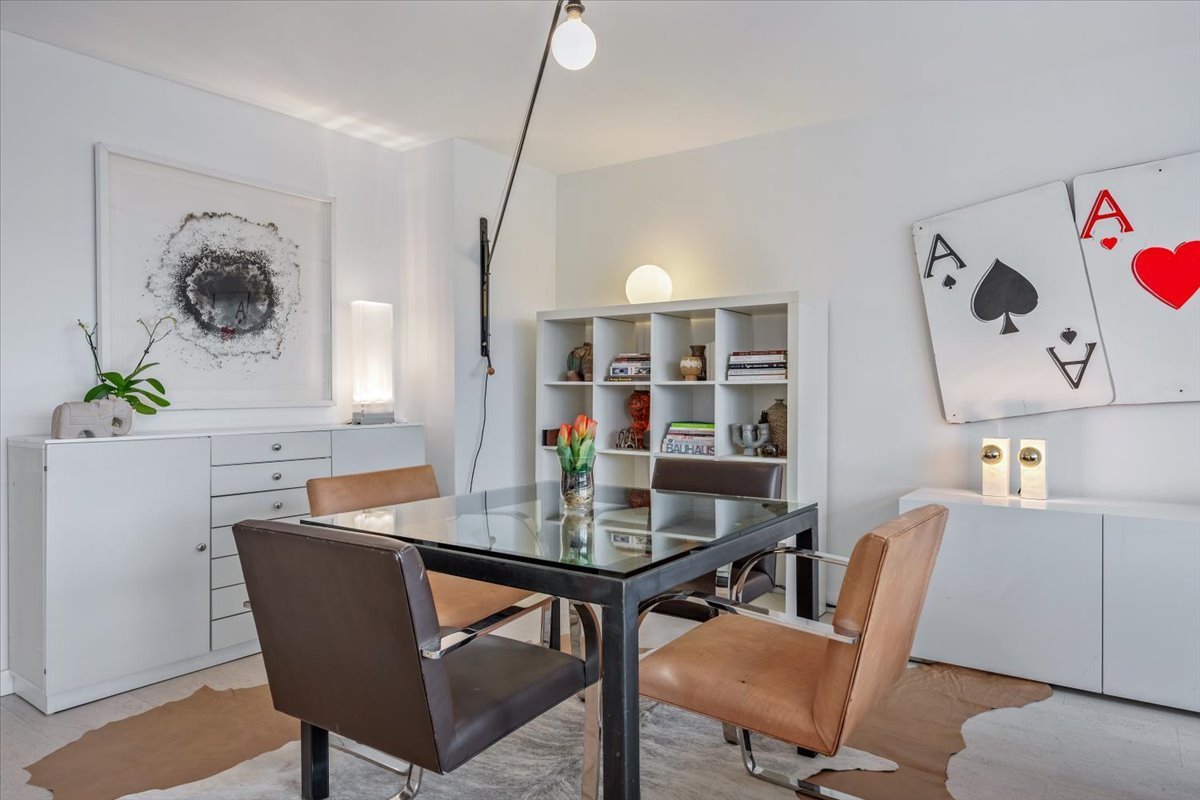 360 East Randolph Street, Unit 1002 Chicago, IL 60601 - Photo 15 of 27 a workspace with furniture and window