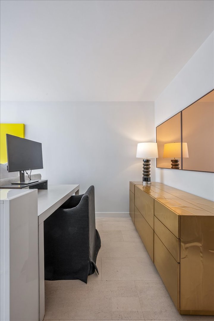 360 East Randolph Street, Unit 1002 Chicago, IL 60601 - Photo 18 of 27 a view of work space with furniture